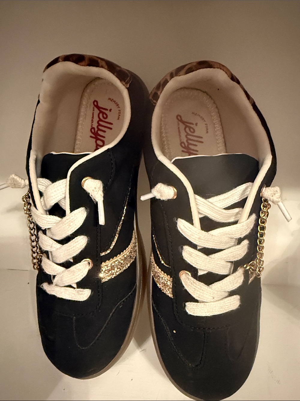 Jellypop Black Sneakers with Gold Glitter Stripe and Chain